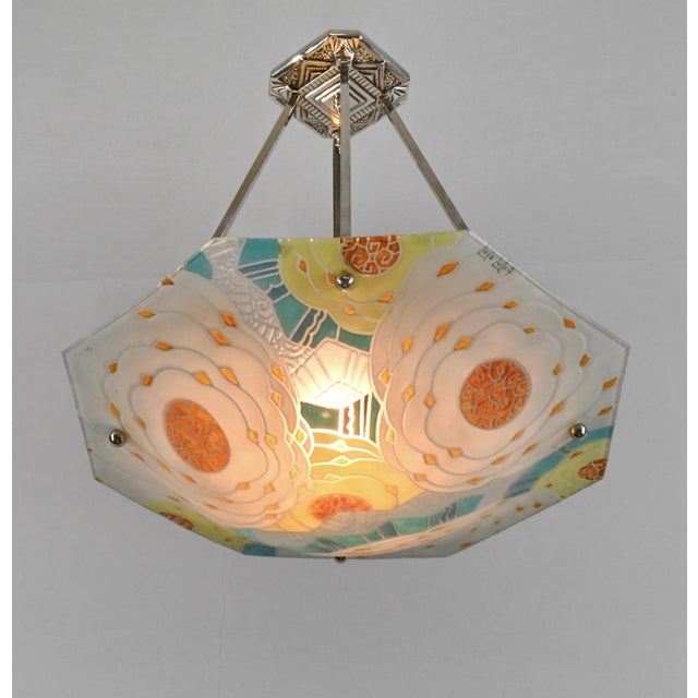 LOYS LUCHA A French 1930s art deco pendant light in nickel plated solid brass or bronze holding an octagonal bowl by Loys...