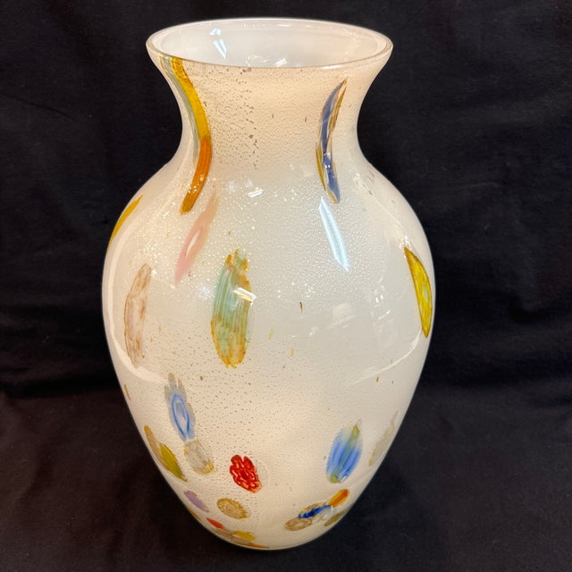 Italian hand blown millefiori vase with silver leaf flecking. Very bright and colorful providing light and pleasure into...