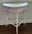 Circa 1900 white wicker Demi Lune table. 21” wide, 11.25” deep, 26.25 tall. Please zoom in on photos. Top little bumpy...