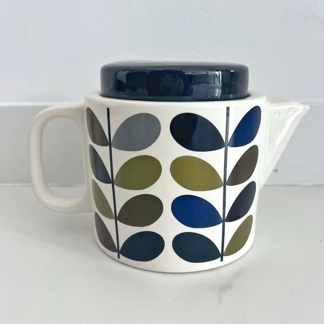 Orla Kiely teapot in Multi Stem pattern in khaki marine print. Complements linear stem pattern inspired by mid-century...