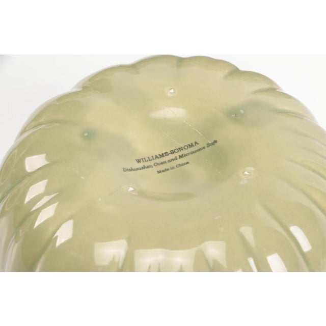 Bring a little autumn charm to the table with this Williams-Sonoma sage green ceramic pumpkin soup tureen with lid and...