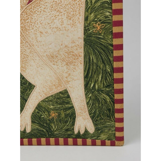 The product is an original folk art tapestry by artist Chris Roberts-Antieau, featuring dressed-up dogs as its subject....