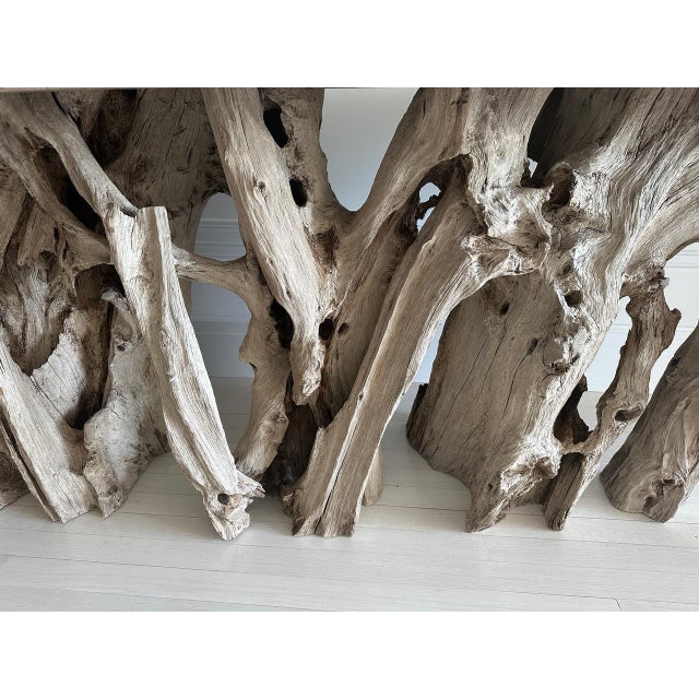 Impressive long console with a fantastic teak root base. This century old teak root resembles stone and is extremely rare...