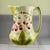 From the Saint-Clément faïencerie, a vintage French barbotine majolica glazed raspberry pitcher, circa 1960s, in the Art...