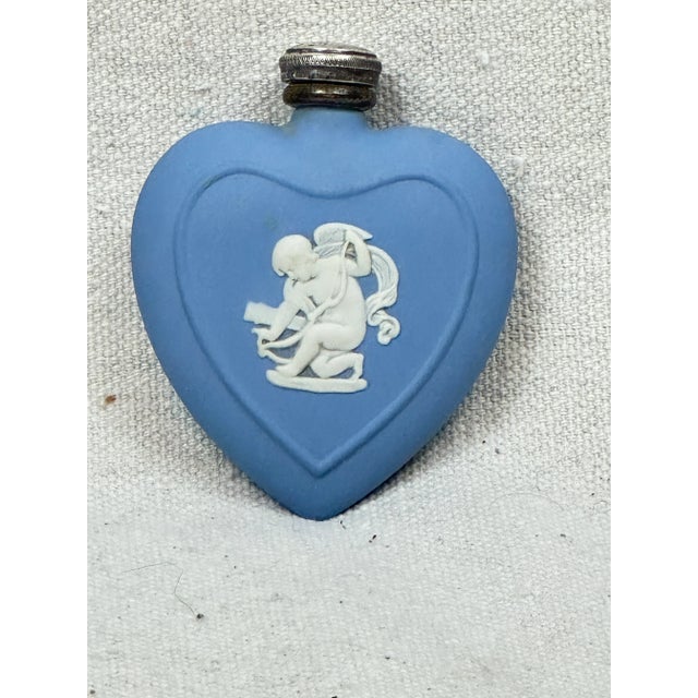Vintage Wedgwood blue Jasperware perfume bottle. This is a pre-owned item so please see all pictures and ask any questions.