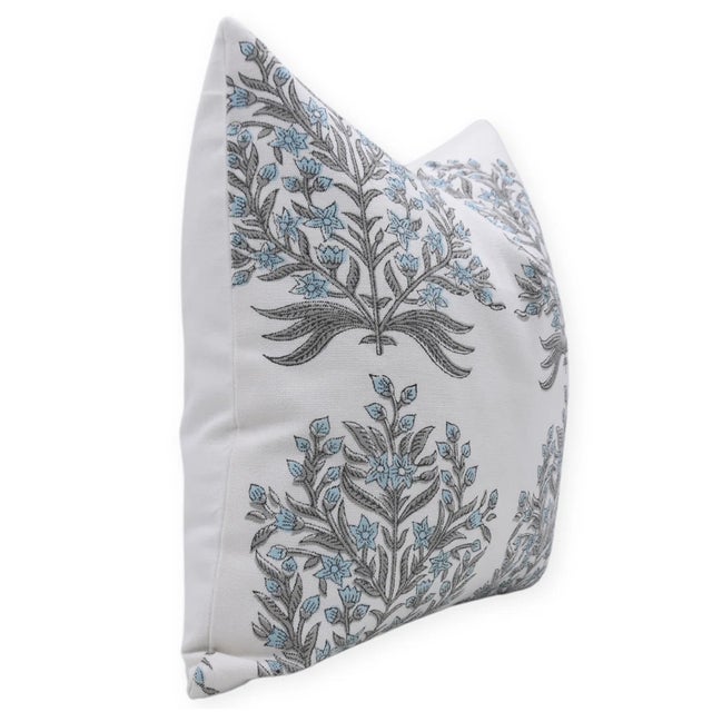 Bring the charm of Vrindavan into your home with this block print handmade cushion cover. Featuring the delicate...