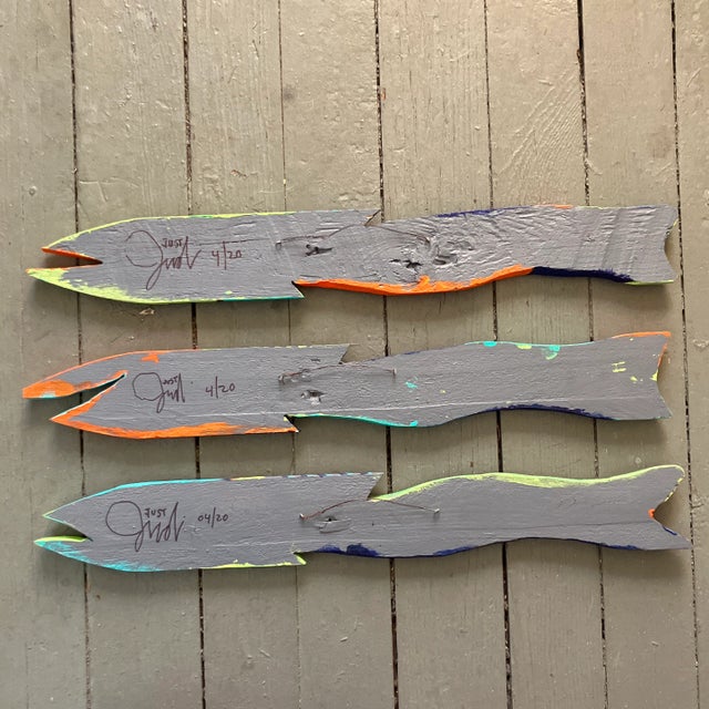 Contemporary original painted tropical fish on carved wood. Set of three. Signed on back by artist. 20x3 in.