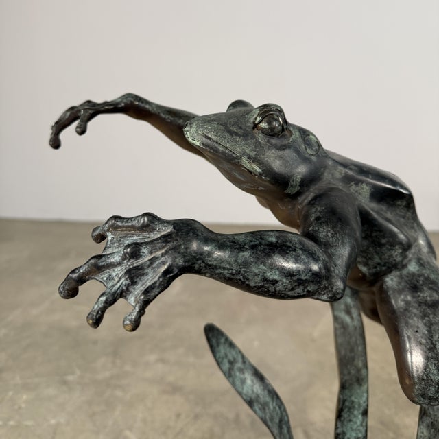Beautifully hand cast bronze fountain sculpture depicting a frog leaping. This is a piece that feels lively and animated...