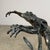 Beautifully hand cast bronze sculpture depicting a frog leaping. This is a piece that feels lively and animated from every...