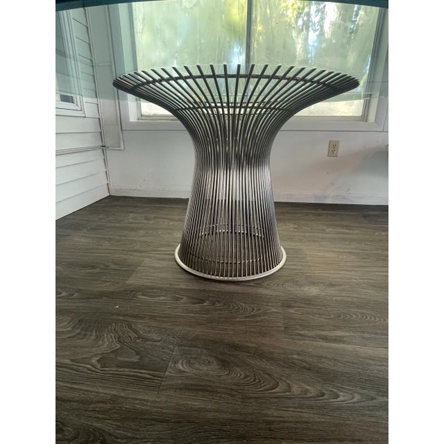 This elegant mid century modern - Warren Plattner for Knoll attributed Dining Table features a sculptural stainless steel...