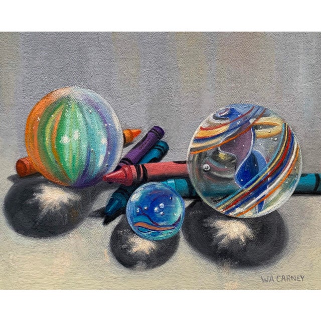 Light Diversions 3 by Wendy Carney | Oil on Linen Panel Still life of marbles and crayons For Sale