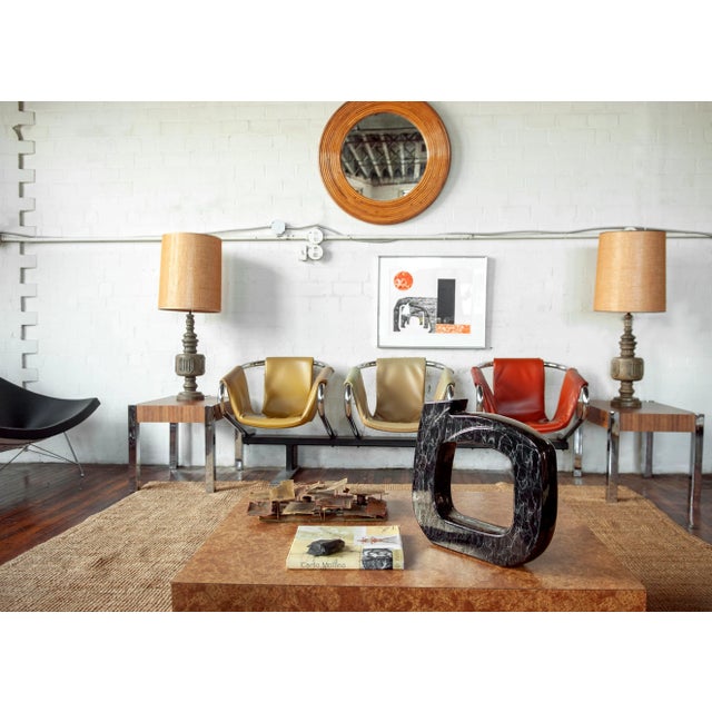 This contemporary Postmodern Vase, with its distinctive black ceramic and marbled detailing asserts itself as a bold yet...