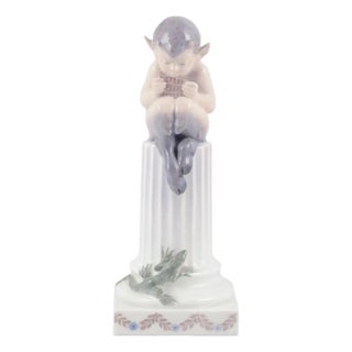Porcelain Whistling Pan Sitting on a Pedestal Figurine from Royal Copenhagen, 1954 For Sale