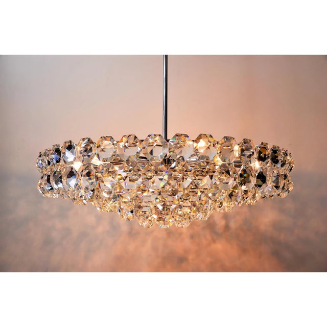- Large chromed Bakalowits chandelier - Circa 1960s - 18 Bulbs - High of the chandelier can be changed - The crystal glass...