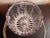This is Oneida Crystal Germany 6" Ice Bucket with Gold Tone Handle Procured at auction