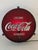 An unusual lighting fixture made from original Coca-Cola advertising: This round advertising grid was transformed into a...