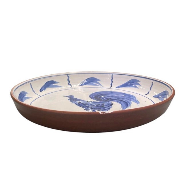 This charming vintage ceramic serving bowl (often used as a deep decorative plate) features a classic hand-painted cobalt...