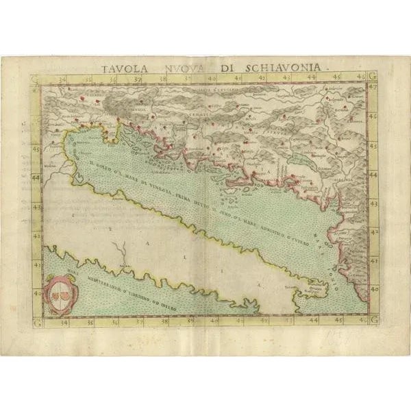 Antique map titled 'Tavola Nuova di Schiavonia'. Ruscelli's map of the Balkans, with a coat of arms. The mountains are...