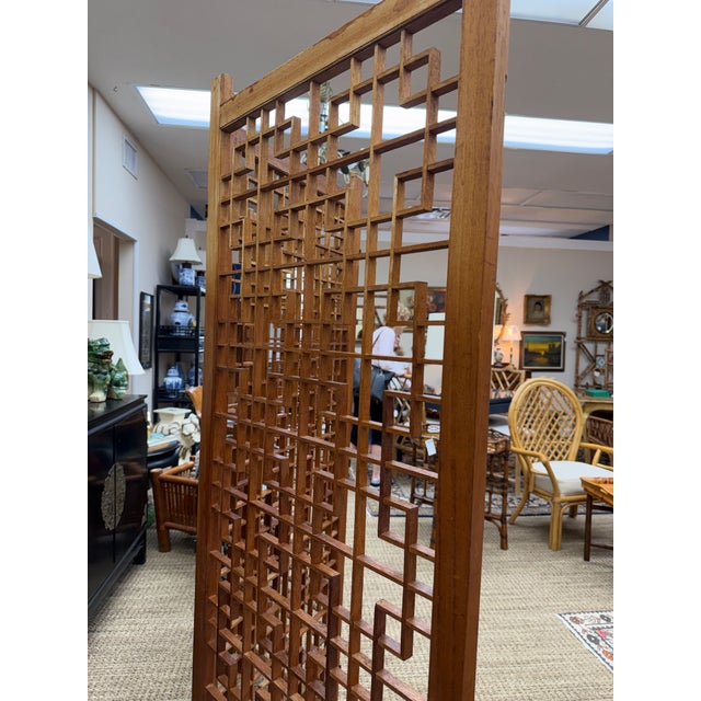 This is a fabulous screen from Okinawa, Japan, crafted during the mid century. It was shipped to the United States after...