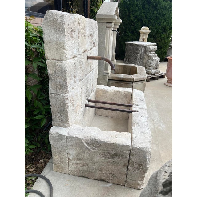 French Country Le Chaux Hand Carved and Distressed Limestone Block Fountain From the South of France For Sale - Image 3 of 12