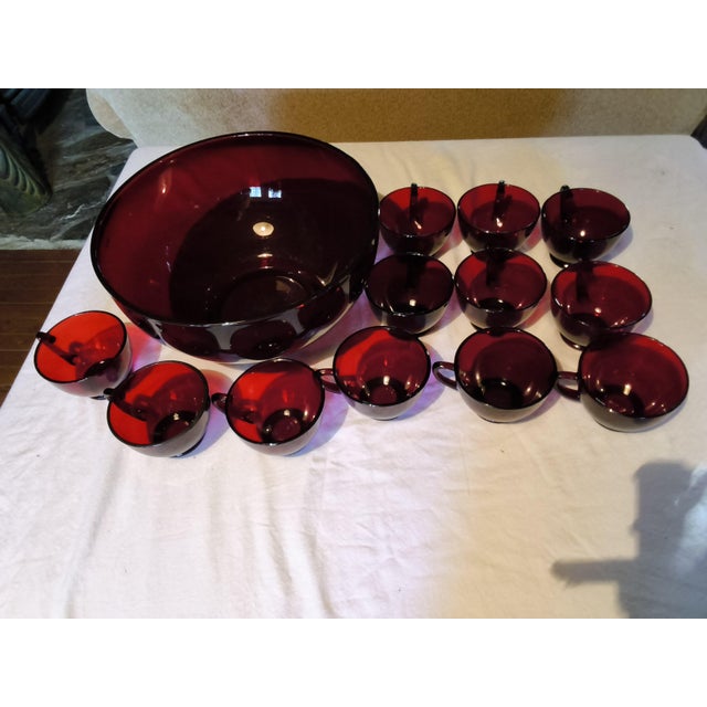 Bring classic mid-century elegance to your next holiday gathering with this stunning 13-piece vintage Royal Ruby Red punch...