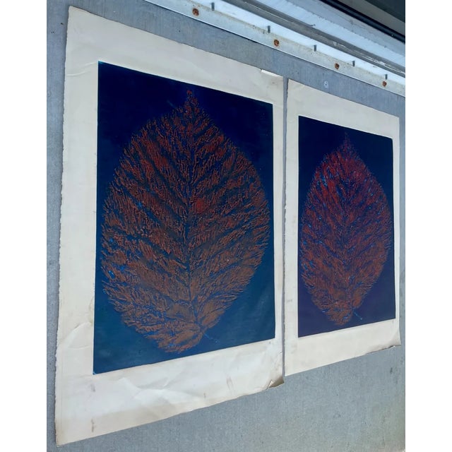 Lithographs artwork by Mariette Bevington (b. 1925). Signed in the lower right corner. Both featuring large leaves. One is...