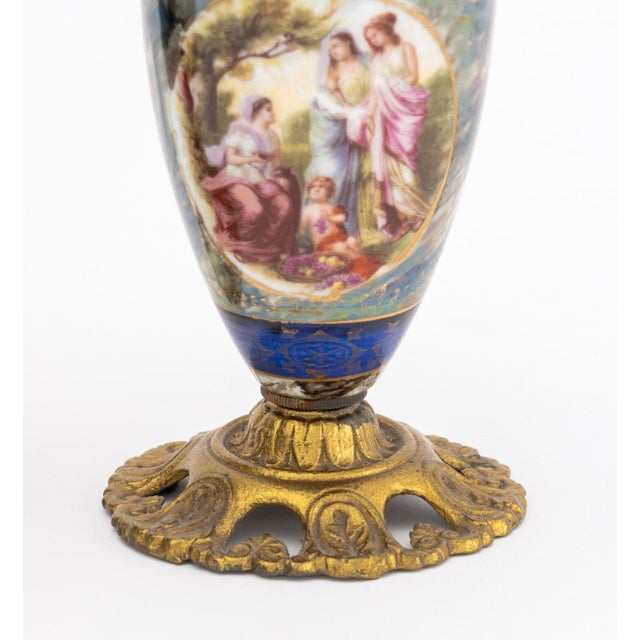 Pair of French Gilt Metal Mounted Porcelain Table Lighters, each with classical figure vignette. 6.5" H x 3" Diameter....