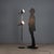 Floor lamp with two adjustable and height-adjustable light points in lacquered and chromed metal. This piece is attributed...