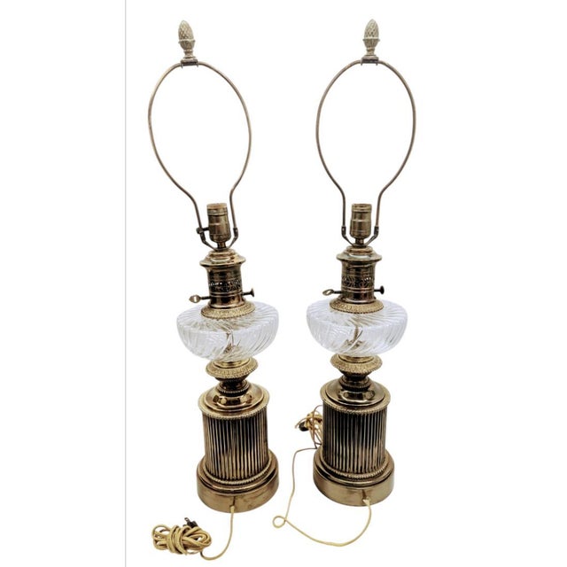 VINTAGE SET OF BRONZE AND GLASS TABLE LAMP This set of 2 beautiful bronze lamps combined with glass have a rare and unique...