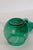 A hand-blown Empoli vetro verde glass apothecary jar with lid, crafted in Empoli, Italy during the 1960s. Executed in the...