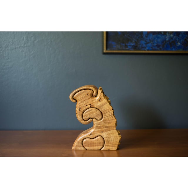 Mid century California modern jewelry trinket wood puzzle box by Fred and Marilyn Buss circa 1970s. This sculptural piece...