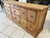 Vintage 1950s workshop sideboard. Made of fir, it features 11 drawers: 8 of the same size and 3 of varying dimensions....
