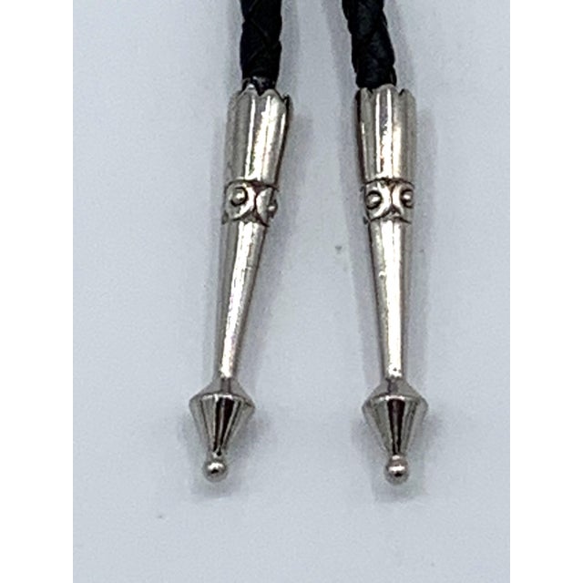 AMAZING ! Stunning Roger Skeet Jr Sterling Silver Bolo Tie! This incredible piece is more than just an accessory; it's a...