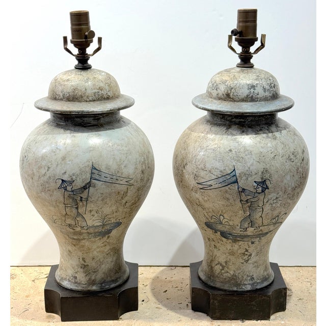 Pair of Deft-Style Chinoiserie Urn Lamps with Banner-Bearer Decoration A refined and atmospheric pair of chinoiserie urn...