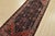 An authentic semi-antique tribal Hamedan runner hand-knotted with fine wool and natural dyes. This nomadic oriental rug...