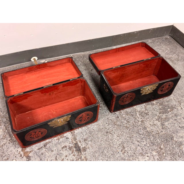 Design Plus Gallery presents a Pair of Vintage Korean Wedding Boxes/Dowry Chests. This decorative pair showcases black...