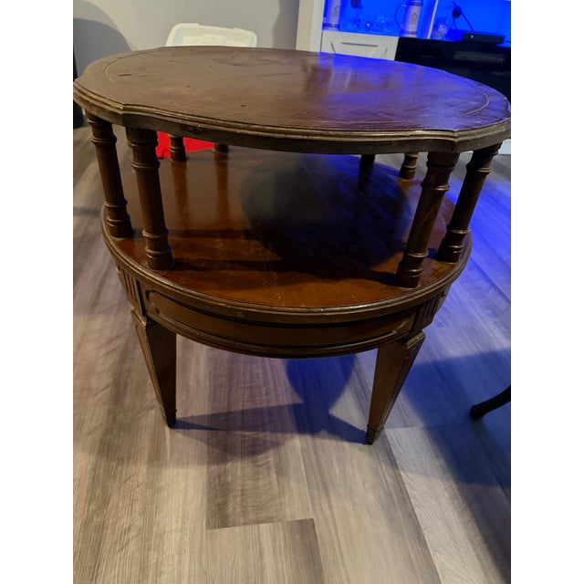 Mersman 8719 tiered table two-tiered "step-up" round table featuring turned spindles (ornate pillars) separating the top...