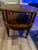 Mersman 8719 tiered table two-tiered "step-up" round table featuring turned spindles (ornate pillars) separating the top...