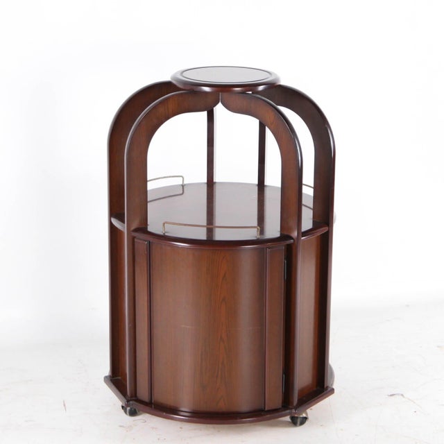 Charming and unique vintage Japanese mini bar on wheels with three wooden and brass doors. This high-quality bar is very...