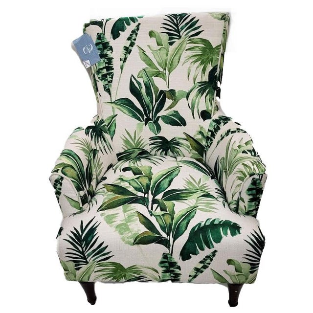 The Junnell Arm Chair by Linon has an eye catching design and style. Upholstered in a polyester botanical leaf print...