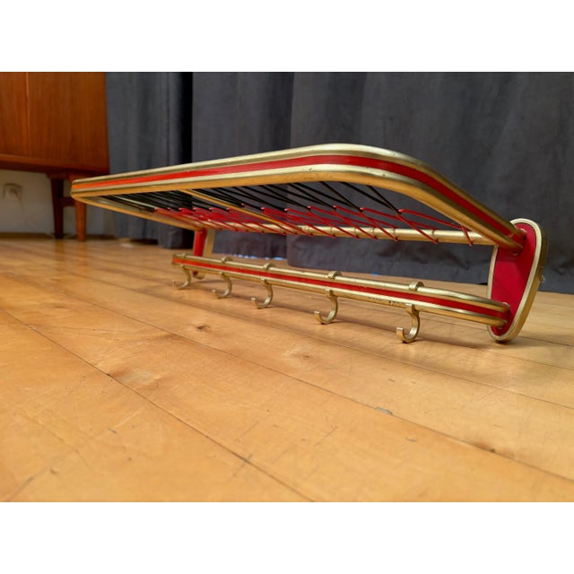 Rockabilly coat hanger from the 1960s. In good original condition. Attractive, cheerful, and practical design.