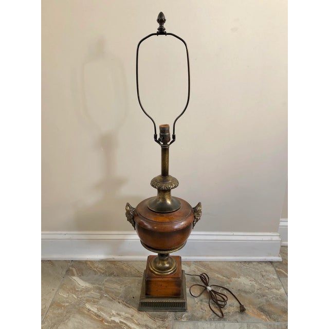 A pair of Frederick Cooper wood urn table lamps with figural brass handles.