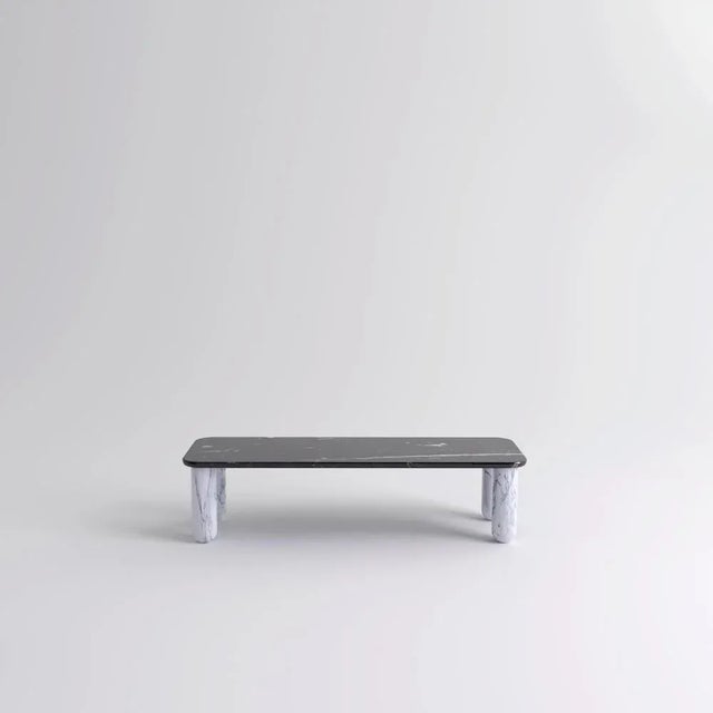 Small black and white marble "sunday" coffee table, jean-baptiste souletie dimensions: 50 w x 150 d x 35 h cm materials:...