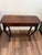 Add timeless elegance to your space with this beautifully crafted vintage/antique-style wooden console table. Featuring a...