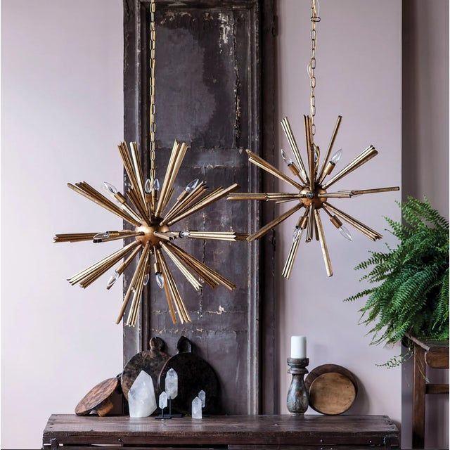 New Item. Not Vintage. Inspired by the radiance of an exploding star, a stunning spray of pine rods with an antique gold-...