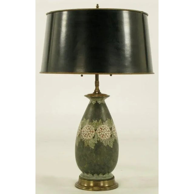 Hand thrown pottery table lamp. Vase form body with brass base and cap along with double cluster sockets. Black with green...