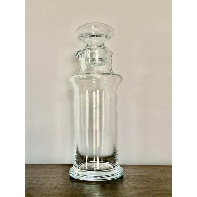 Per Lutkens designed this carafe or spirits bottle for Holmegaard in 1960-70's. Includes its original stopper. Measures:...