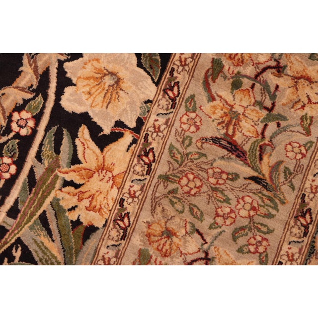Designed with mesmerizing intricacy and gorgeous color palette, this hand-knotted masterpiece demonstrates the beauty and...