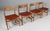 Hans J. Wegner set of four dining chairs in solid soap treated oak, upholstered with tan full grain aniline leather. Model...