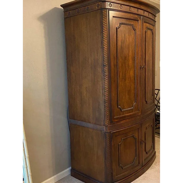 Beautiful armoire / entertainment center from Century Furniture. Dimensions: - 85.5” tall - 49” wide - 28” deep Purchased...